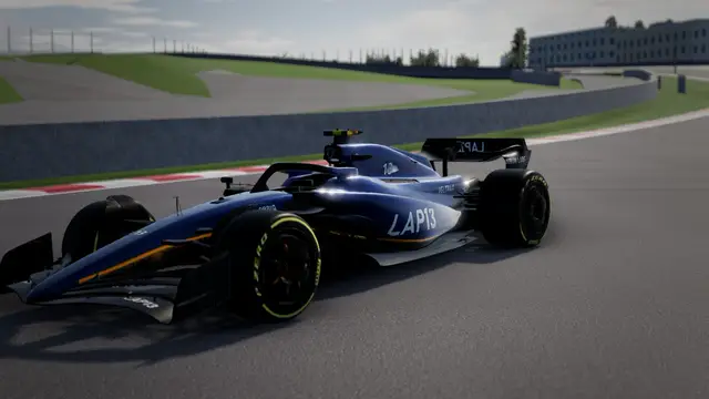 Feeder-class car in navy and orange at Suzuka