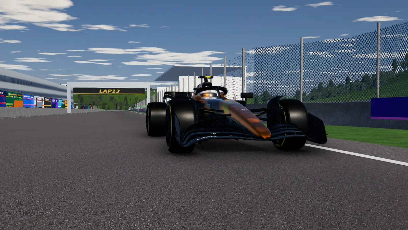 The LAP13 car stopped close to a low trackside camera, nose on